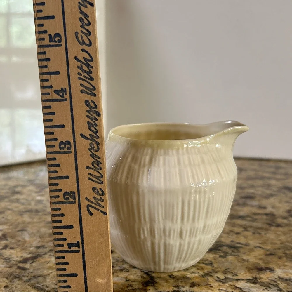 Belleek Neptune Creamer 3.25in Ivory Yellow Shell Pattern Coral Handle Vintage